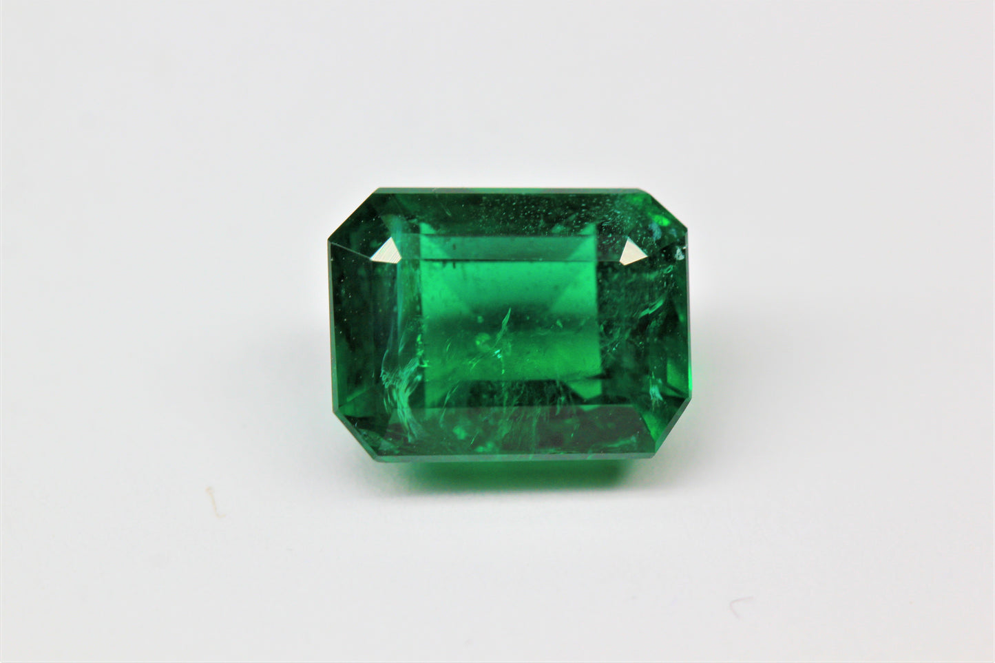 [SOLD] 10x7.65mm Octagonal Emerald Certificated (EME1076T)