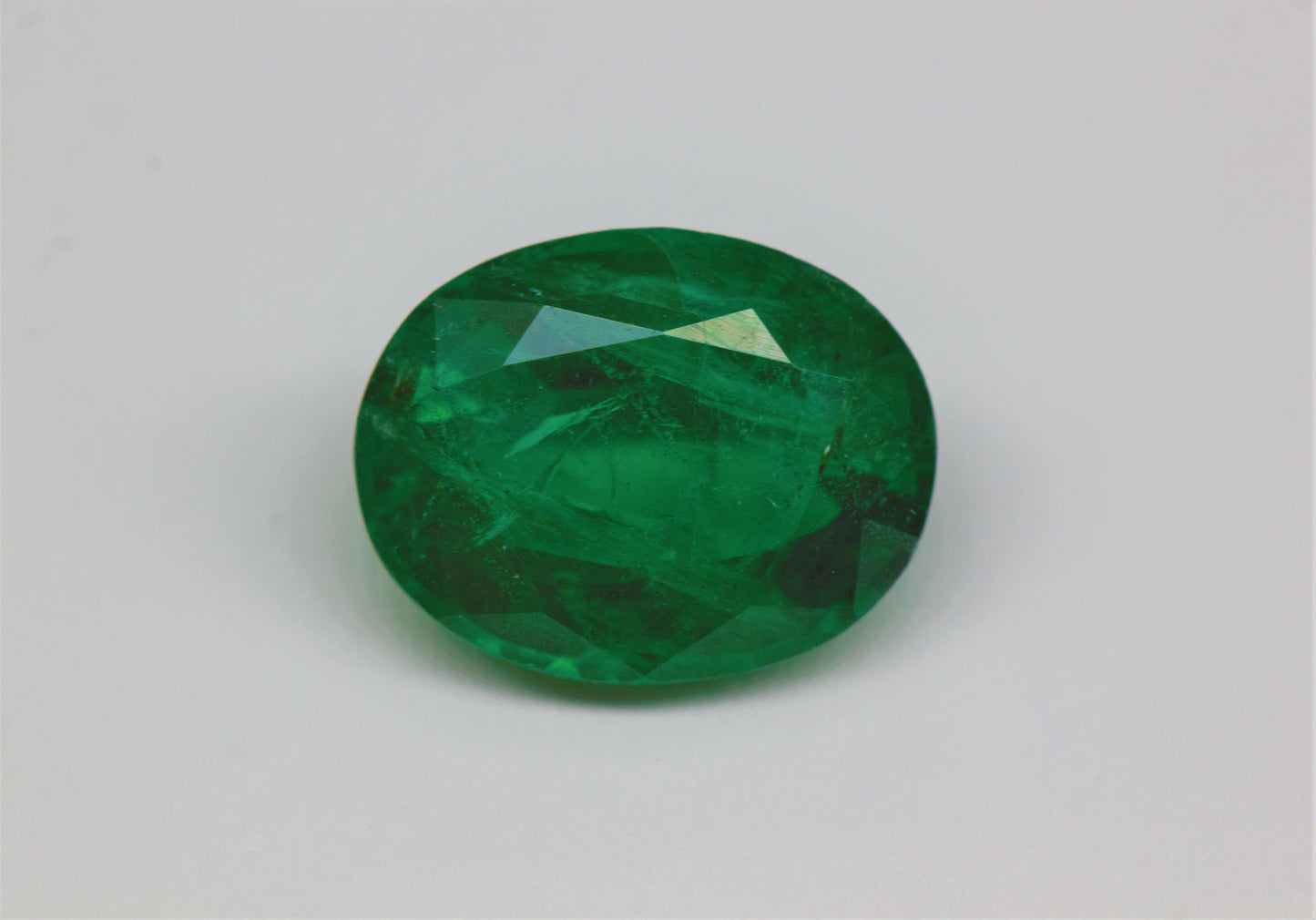[SOLD] 9x7mm Oval Emerald (EMV97C)